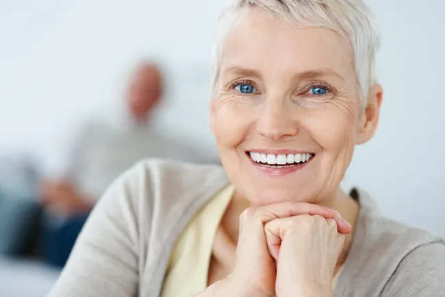 Smiling older woman with a confident smile